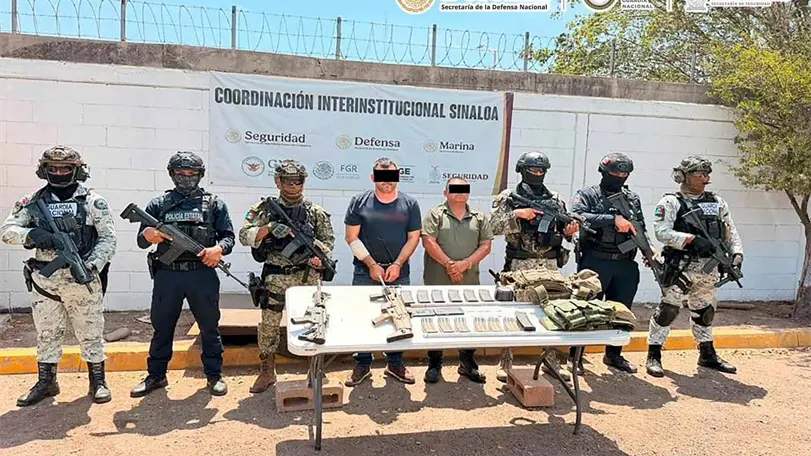 Caen Misael "N", alias "G&uuml;ero Pink", y  Hilario "N". Foto: Gabinete de Seguridad.
